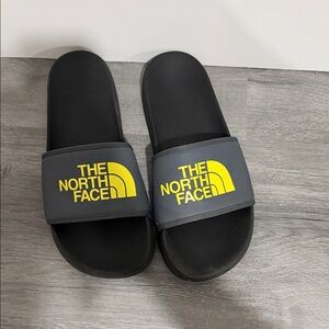 The North Face Black Slides with Yellow Logo